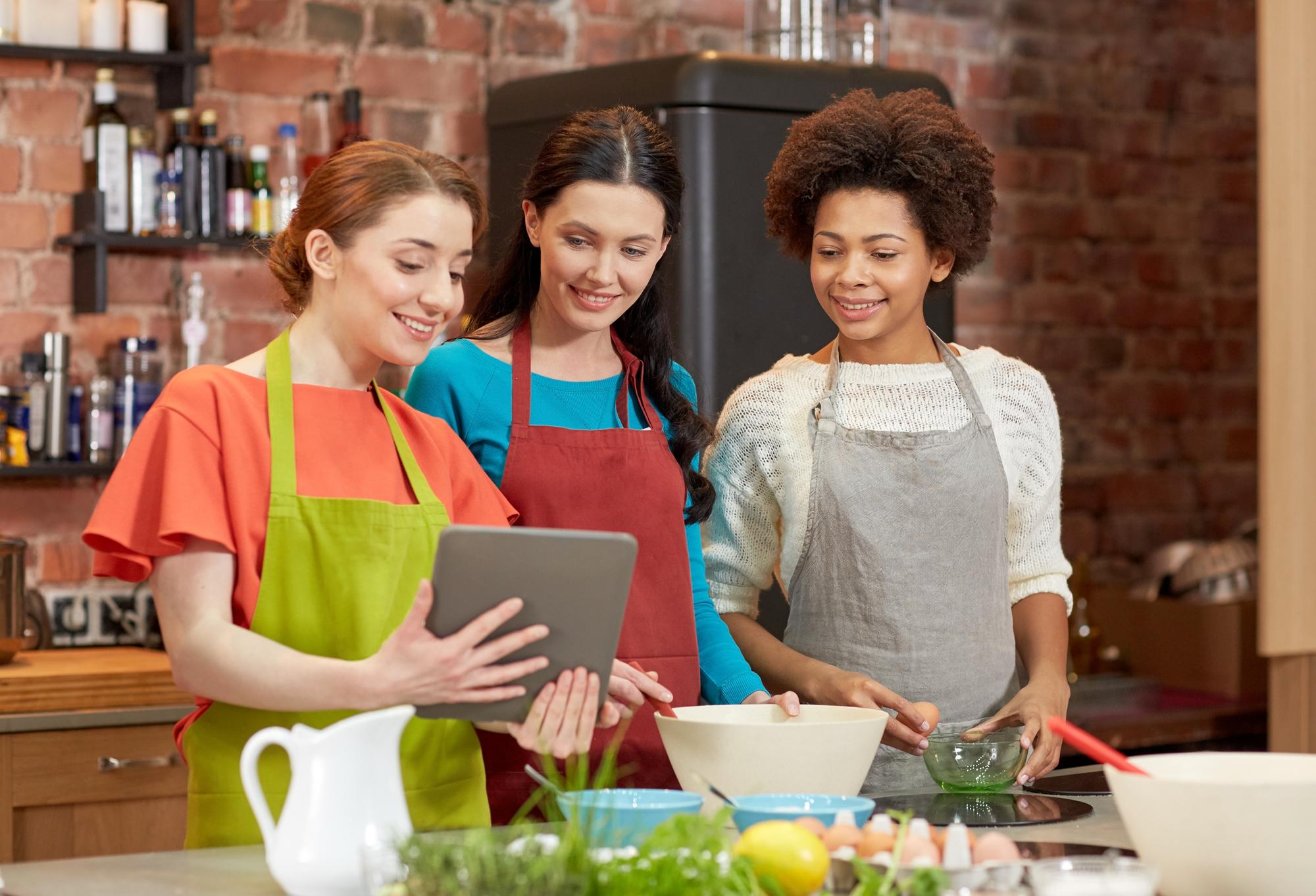 Students cooking together in an online workshop